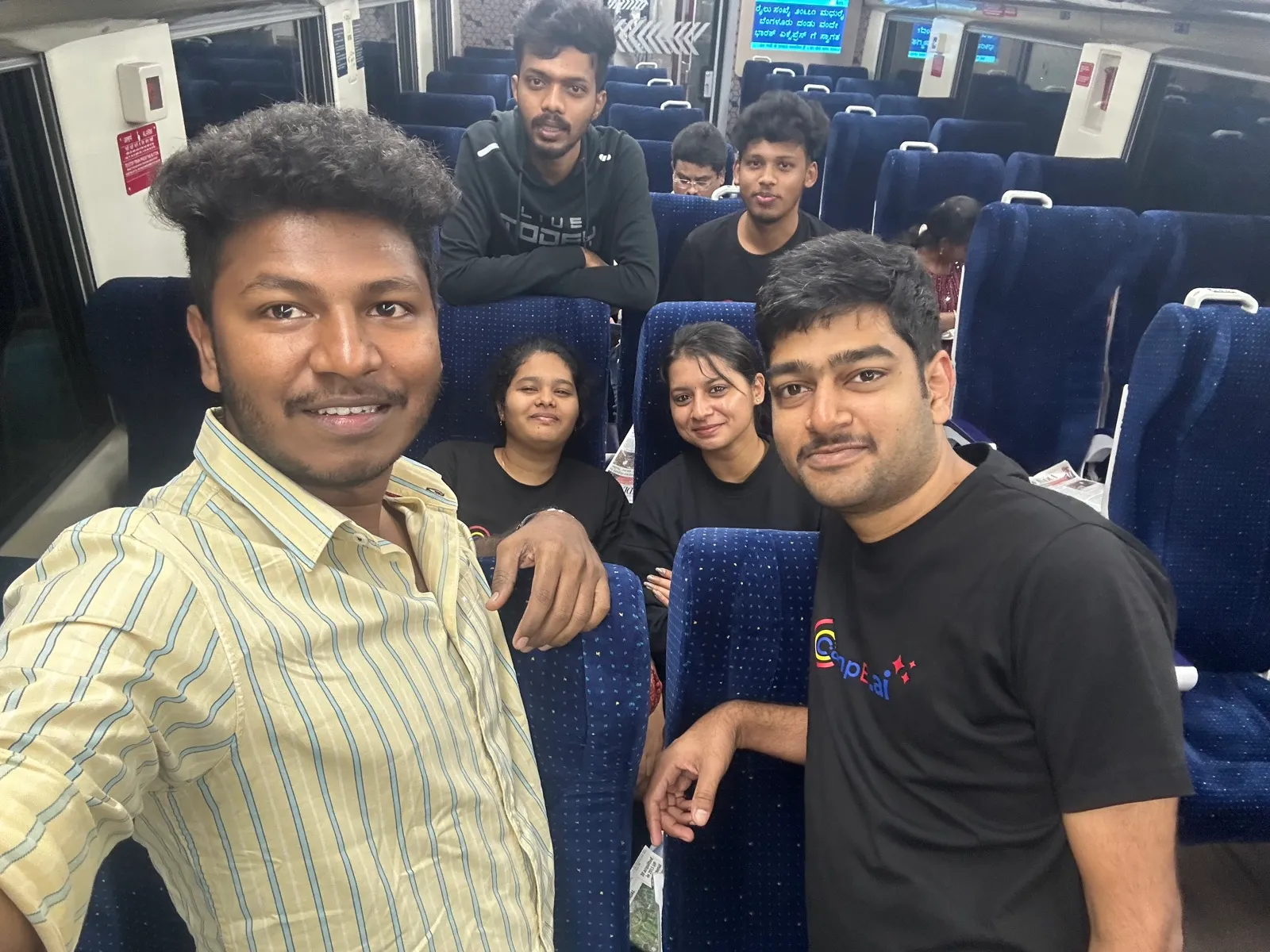 Group selfie on a train